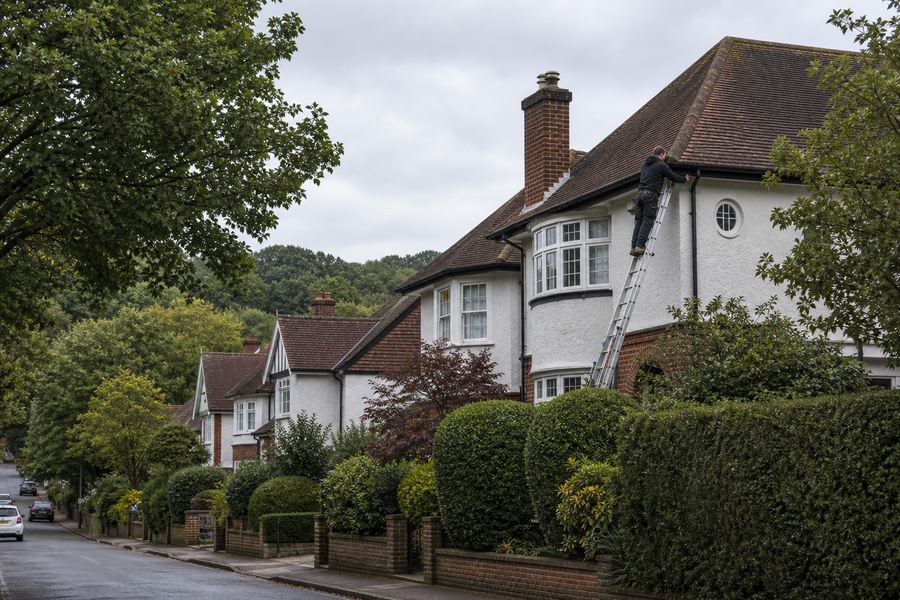 Roof repair on suburban housing in Loughton near the forest